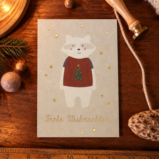Ava & Yves Postkarte „Frohe Weihnachten- Waschbär"